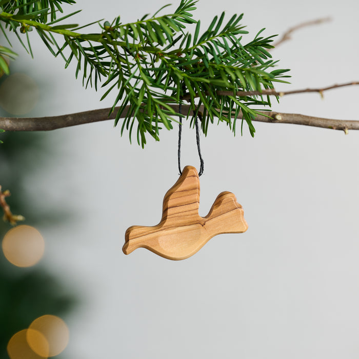 Olive Wood Pocket Peace Dove - Ten Thousand Villages 1