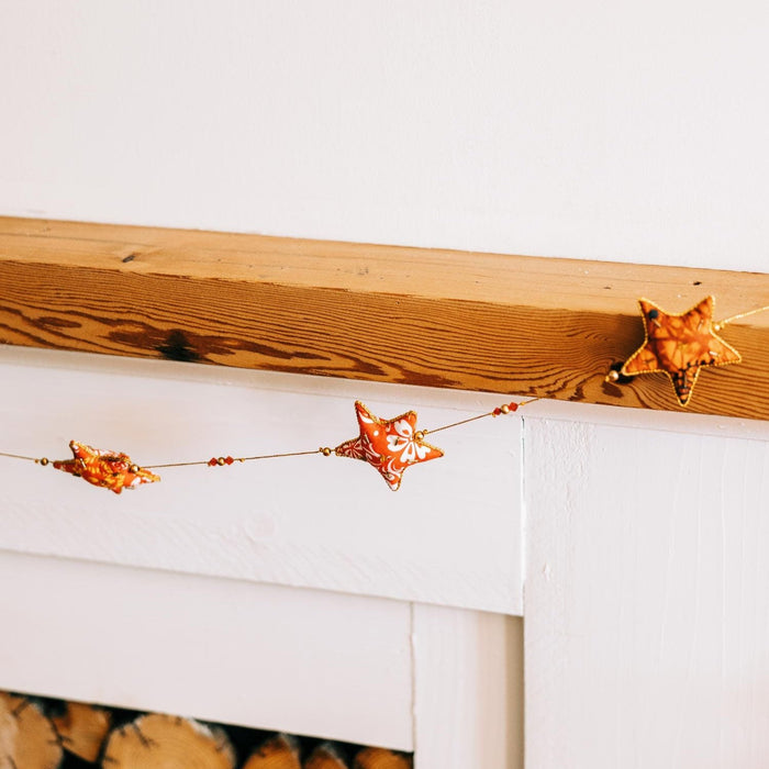 Snowy Star Garland - Ten Thousand Villages 1